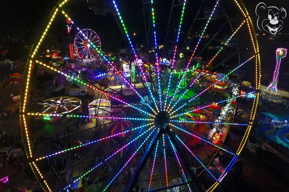 A picture containing laser, Ferris wheel, ride

Description automatically generated