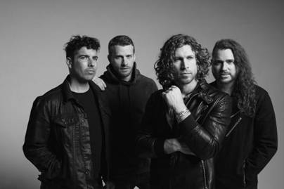 A group of men posing for a photo

Description automatically generated