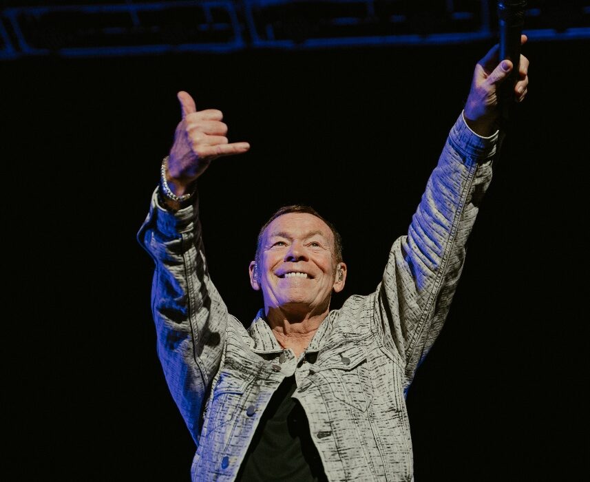 A person holding an object AI-generated content may be incorrect.