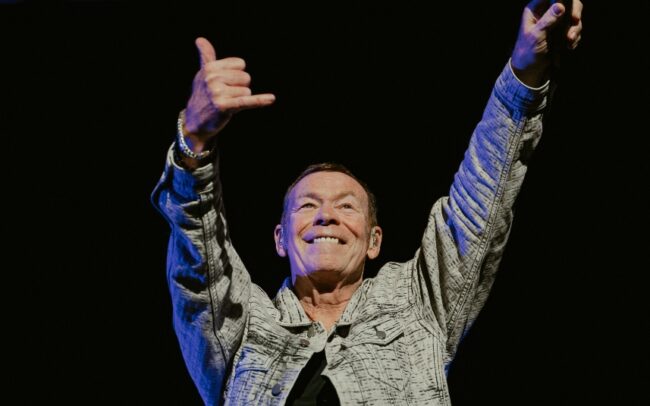 A person holding an object AI-generated content may be incorrect.