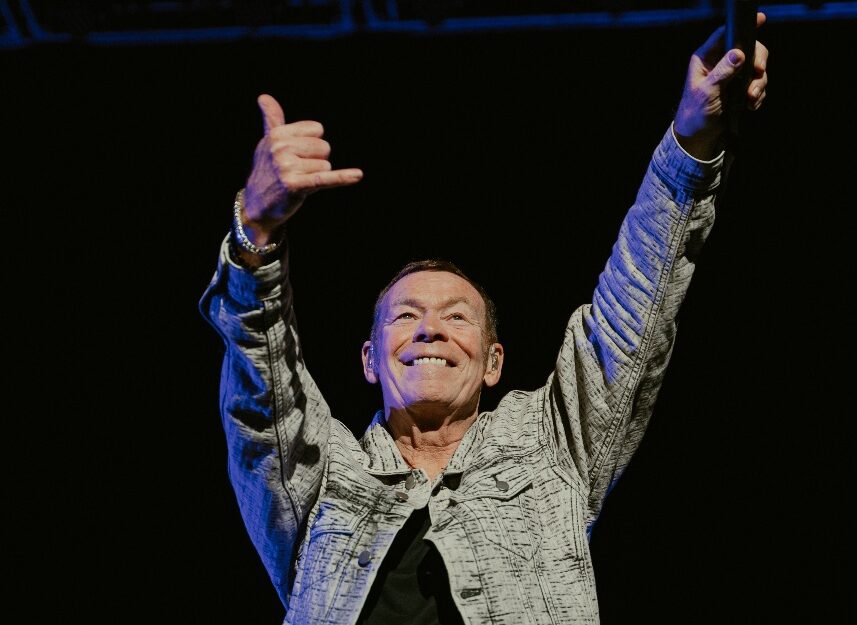 A person holding an object AI-generated content may be incorrect.